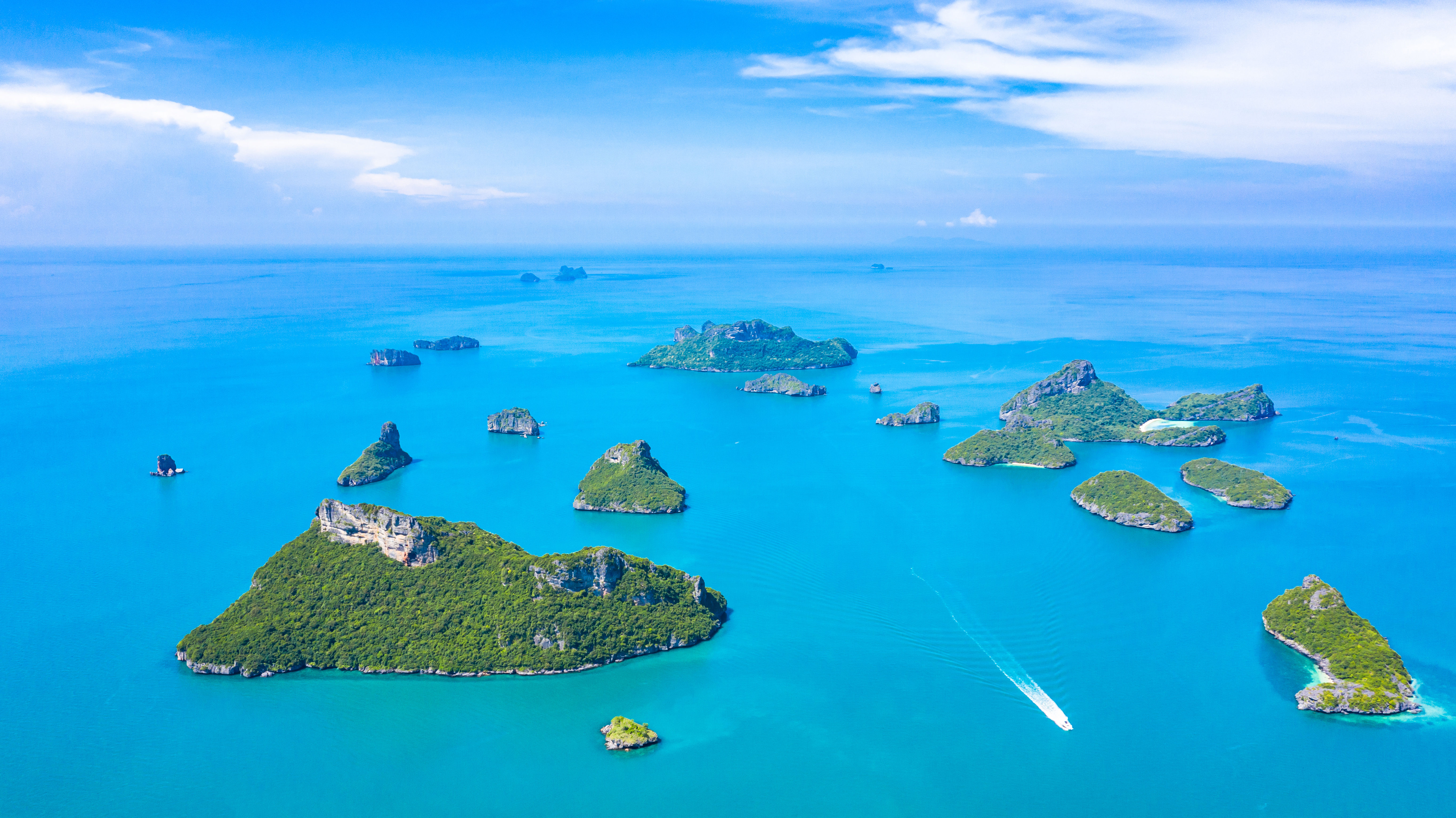 Aerial view of Ang Thong National Marine Park islands and boats in Surat Thani, Thailand.