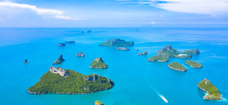 Aerial view of Ang Thong National Marine Park islands and boats in Surat Thani, Thailand.