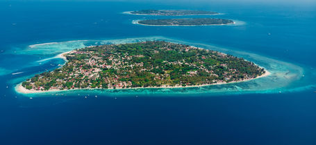 Aerial view of three tropical Gili Islands in Indonesia.