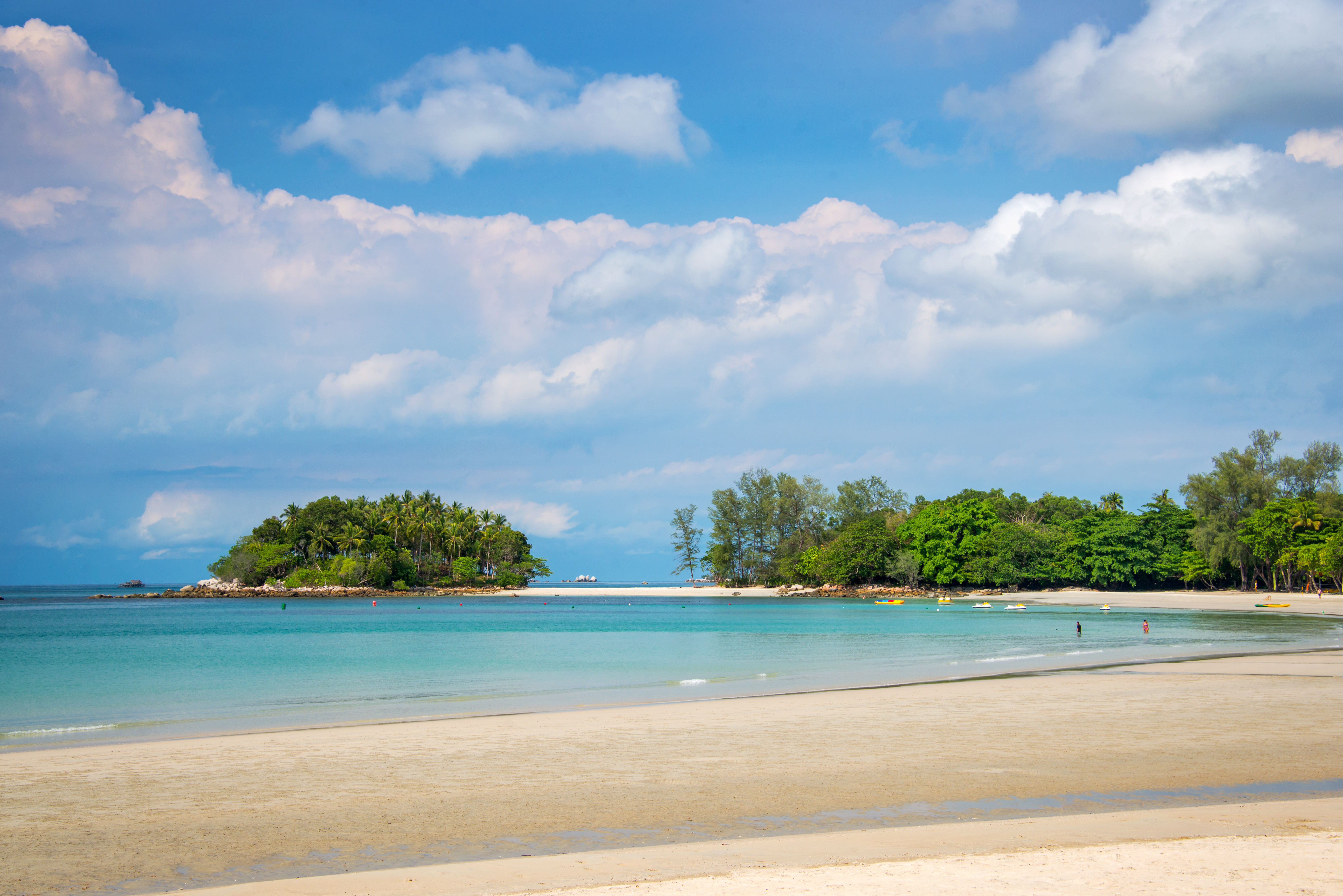 Beautiful beach view with white sand and blue water in Bintan Island.