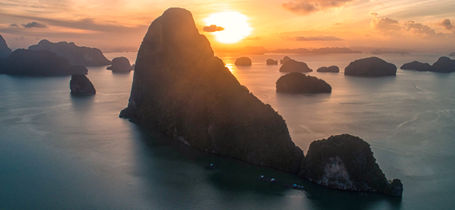 Sunrise over Phang Nga Bay with limestone outcrops and beautiful colours. 