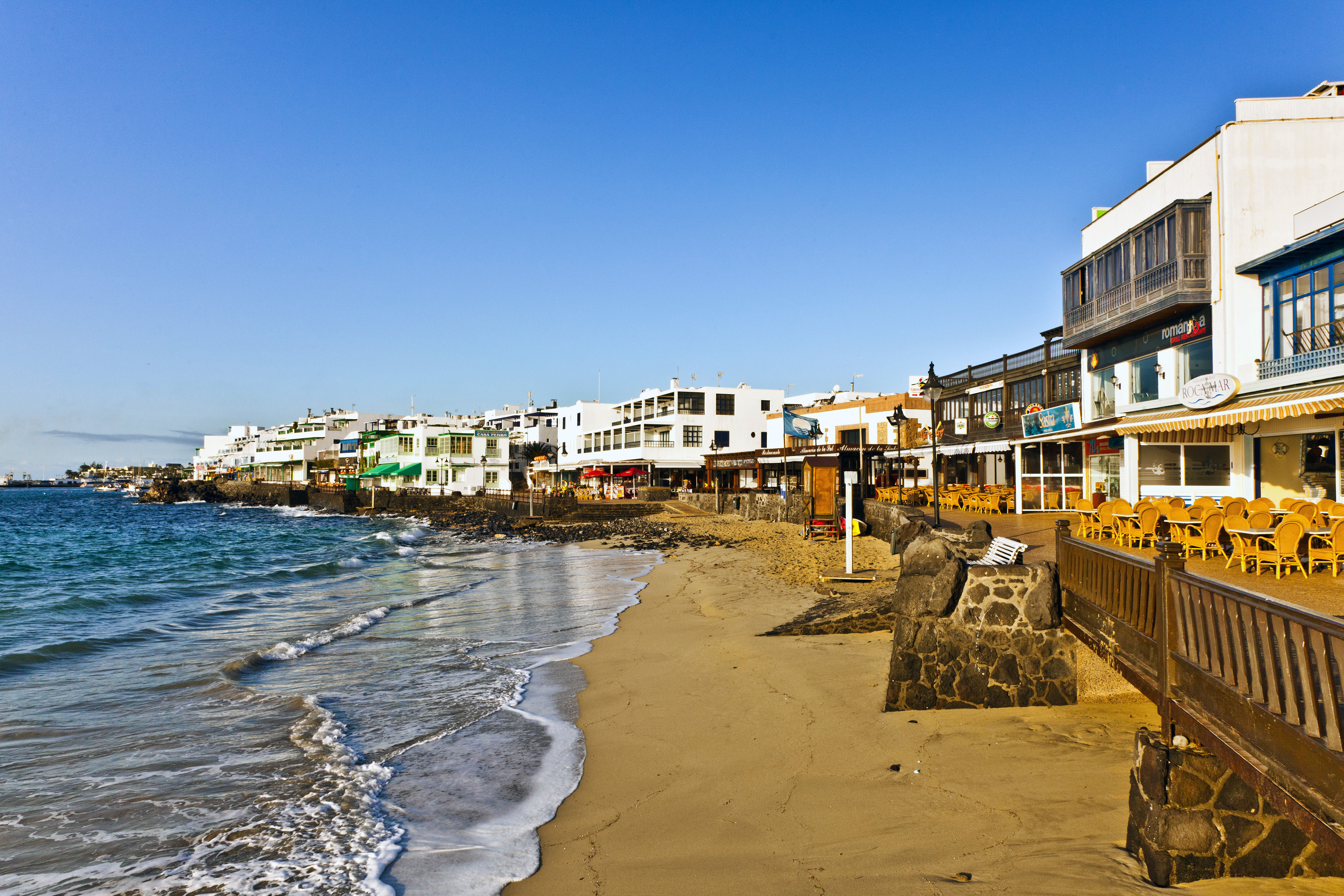 Promenade of scenic Playa Blanca seaside in the morning