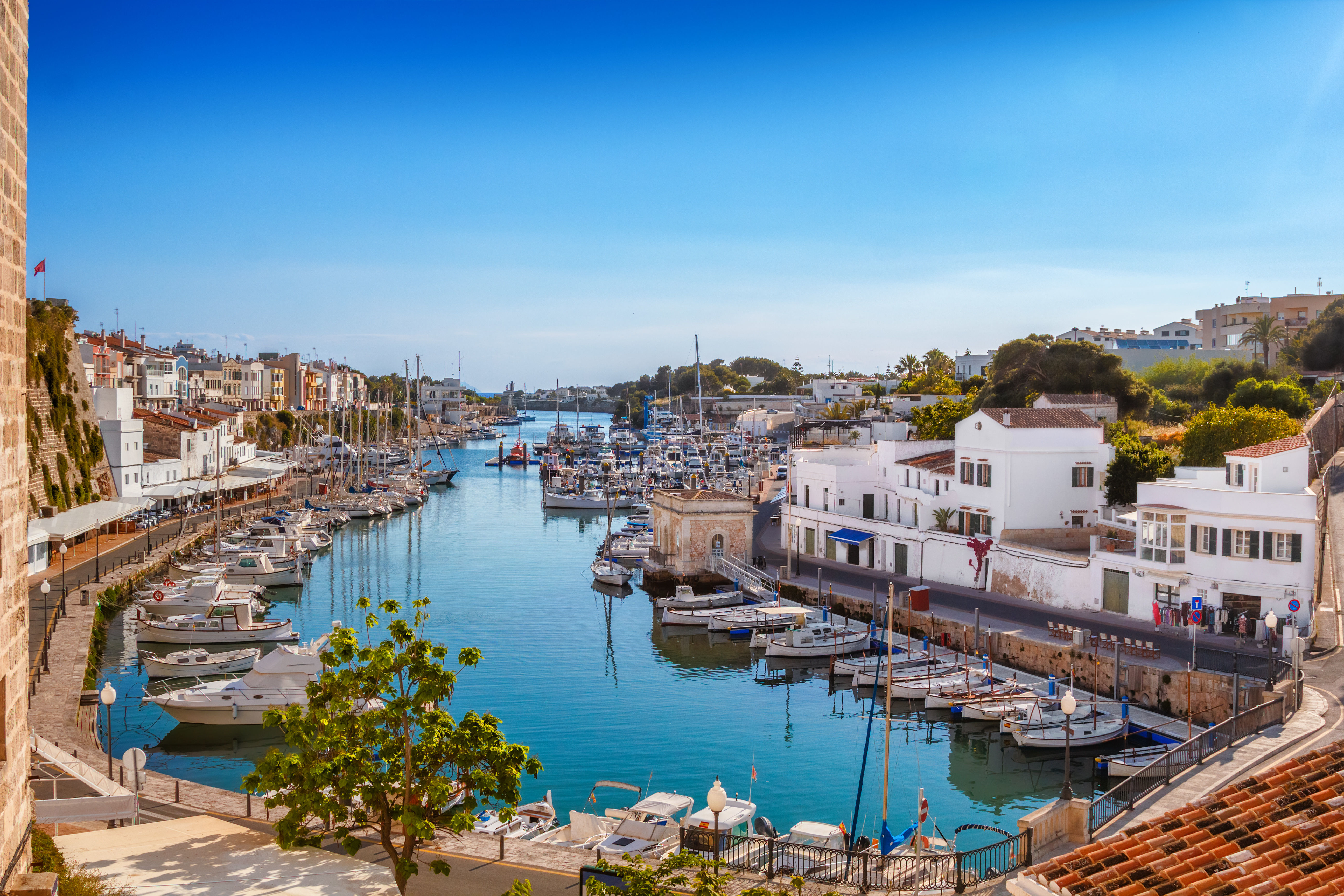 View on old town Ciutadella port on sunny day, Menorca, Spain.