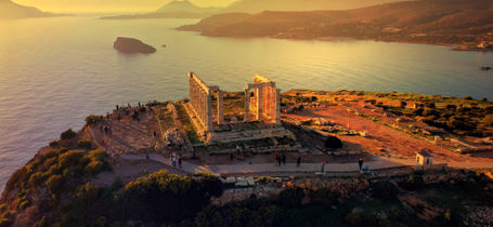 Aerial view of coastline and Temple of Poseidon in Attica, Greece